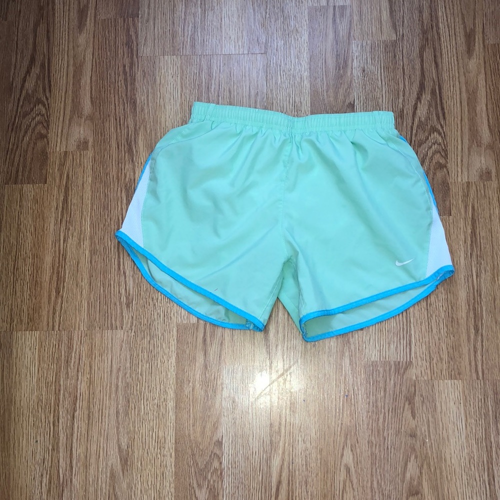 Teal and blue nike running shorts